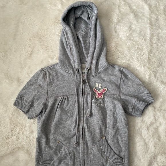 American Eagle Short Sleeve Eagle Fleece Hooded Sweatshirt - Picture 2 of 11